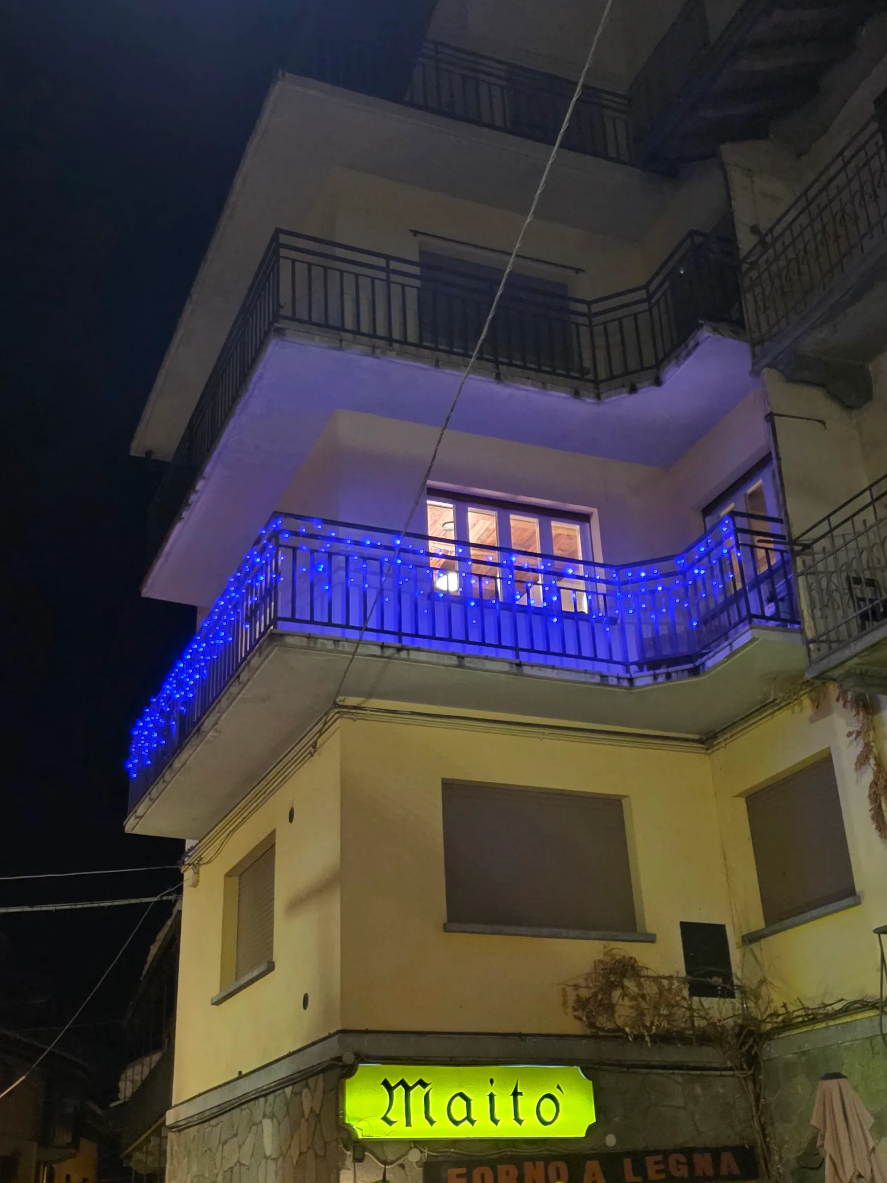 Second-floor balcony atmosphere after dark
